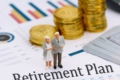 miniature model senior couple standing retirement plan report scaled 1